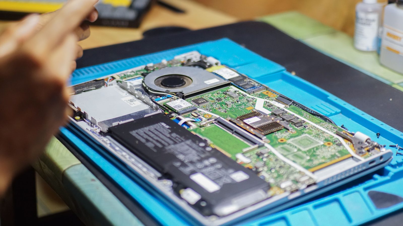 Open laptop motherboard during diagnostics